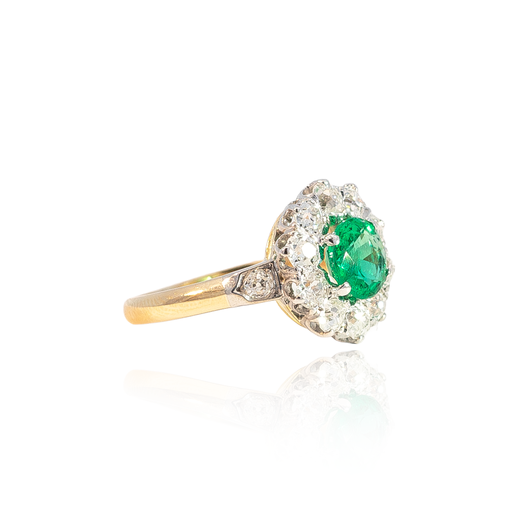 0.70ct Round Emerald And Diamond Cluster Ring