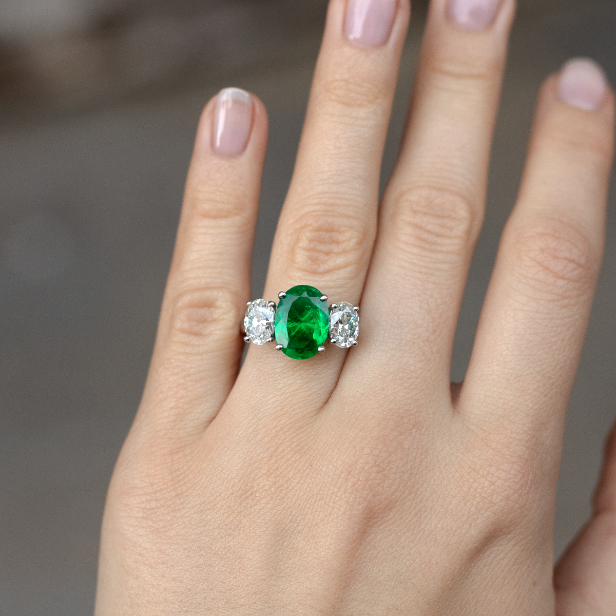 2.60ct Certified Colombian Oval Cut Emerald And Oval Diamond Three Stone Ring