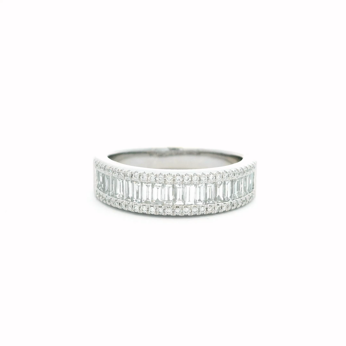 0.72ct Emerald Cut And Round Diamond Half Eternity Ring