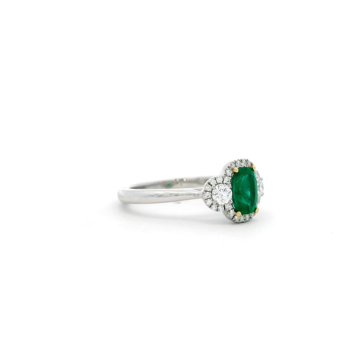 0.75ct Cushion Emerald And Round Diamond Cluster Three Stone Ring