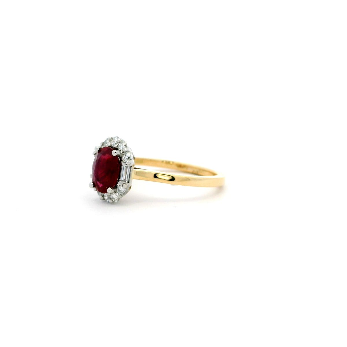 1.06ct Oval Ruby And Diamond Cluster Ring