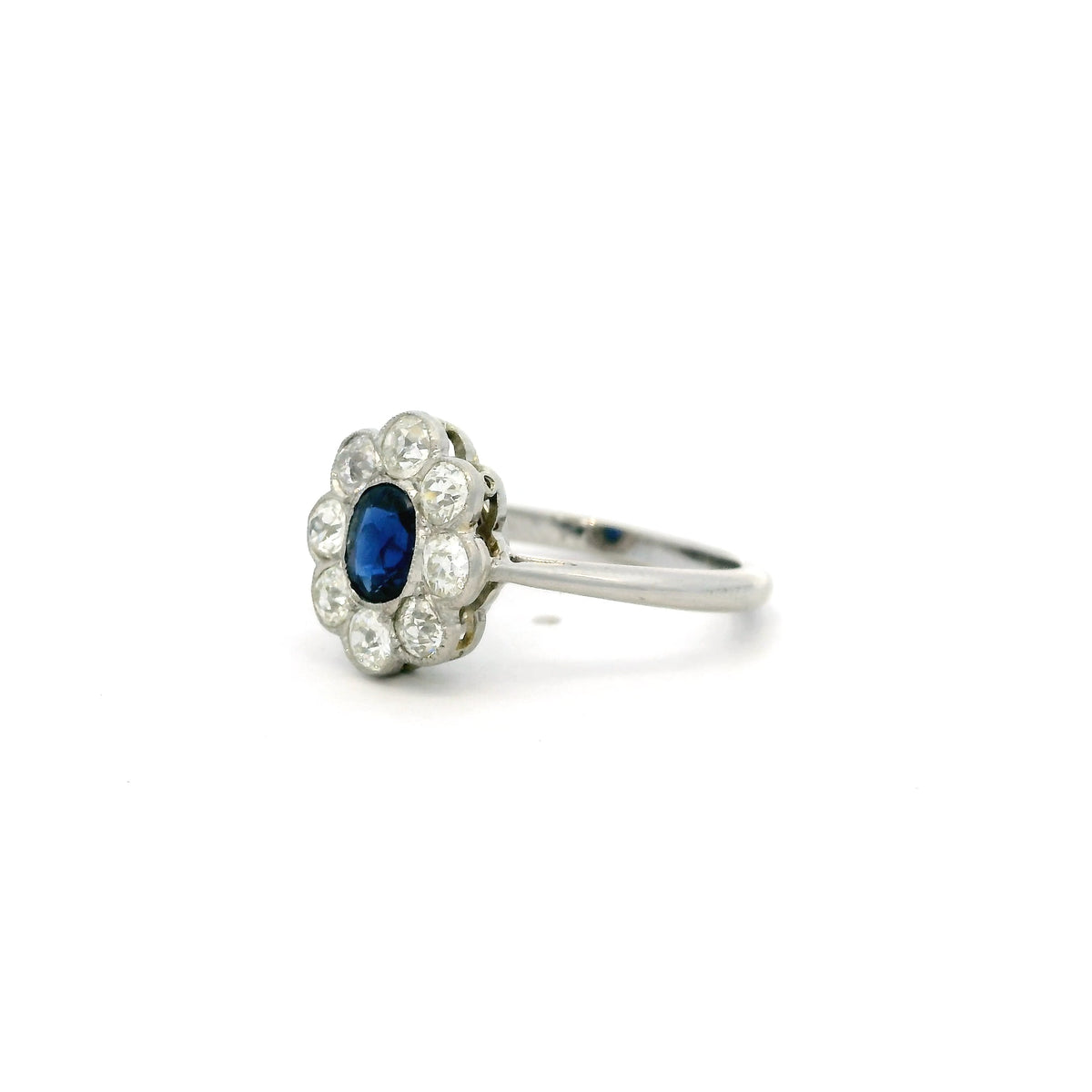 0.65ct Cushion Sapphire And Old Cut Diamond Cluster Ring