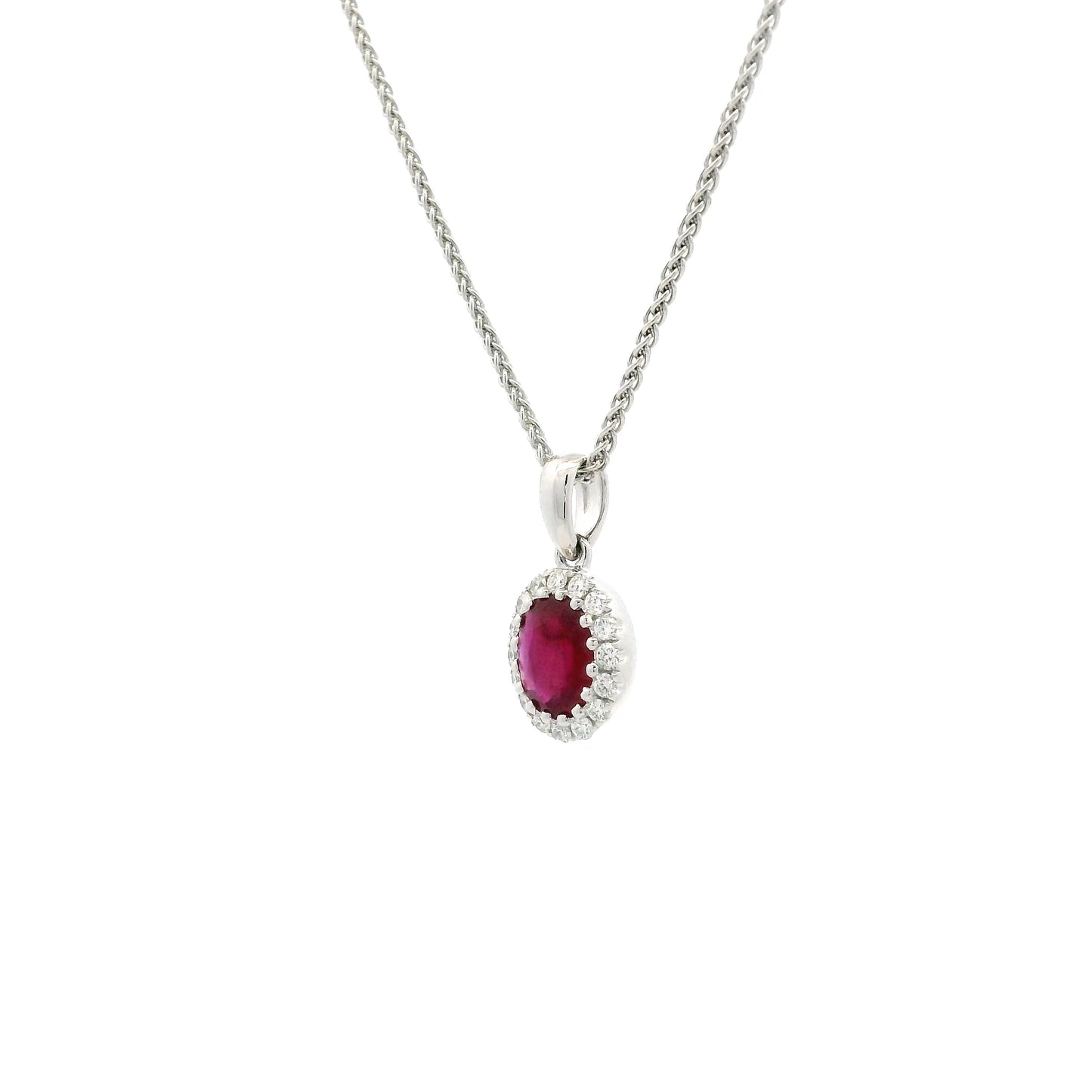 0.64ct Oval Ruby And Round Diamond Cluster Pendant
