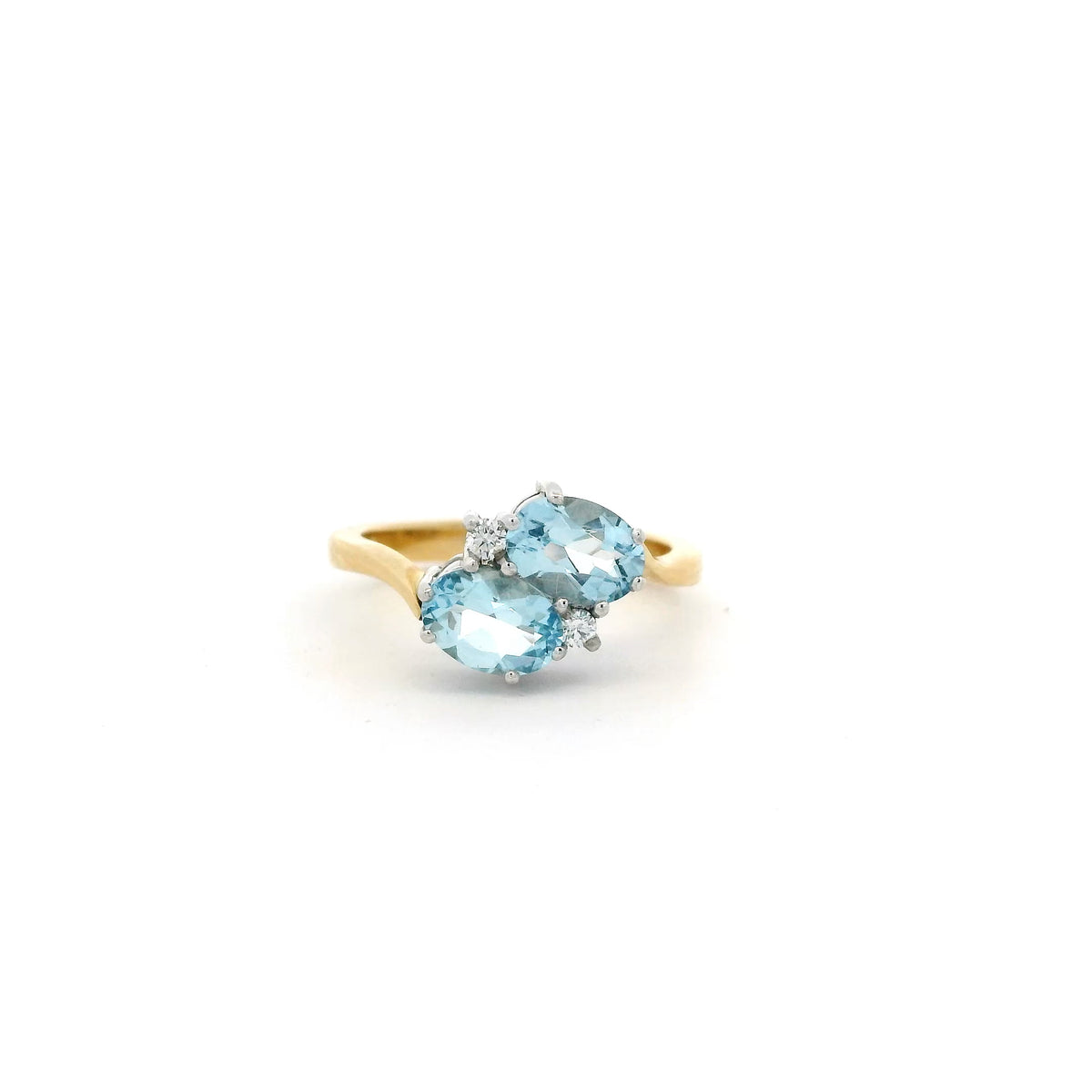 1.30ct Oval Aquamarine And Diamond Two Stone Cross Over Ring