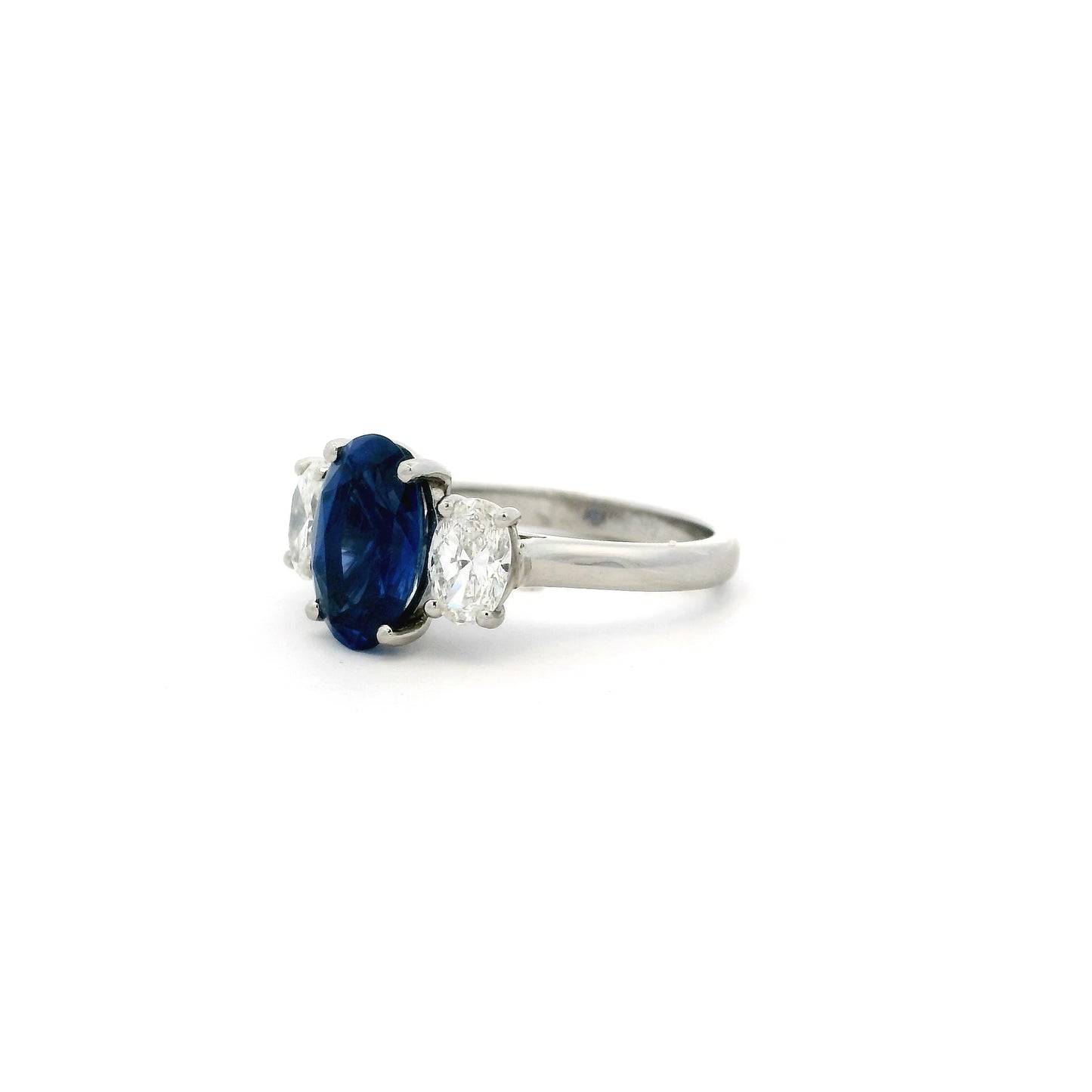 2.95ct Oval Sapphire And Diamond Three Stone Ring