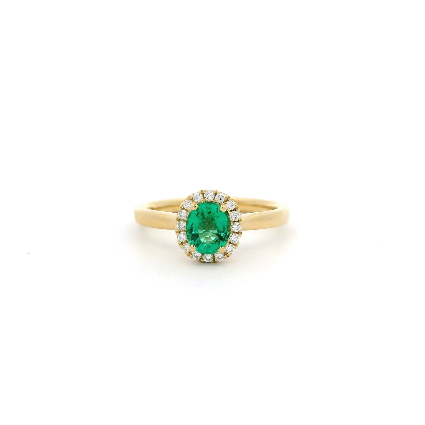 0.65ct Oval Emerald And Round Diamond Cluster Ring