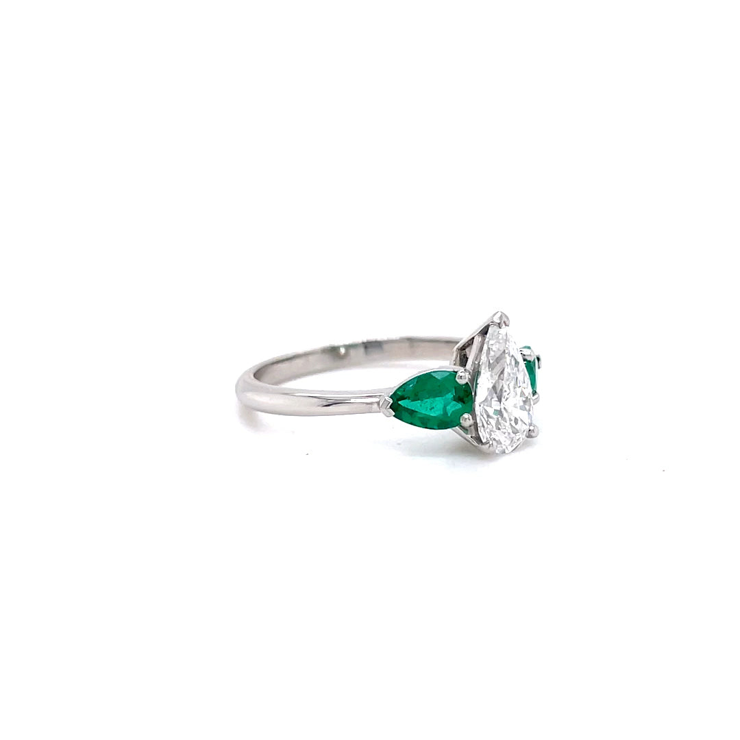 1.02ct Certified Pear Cut Diamond And Emerald Three Stone Ring