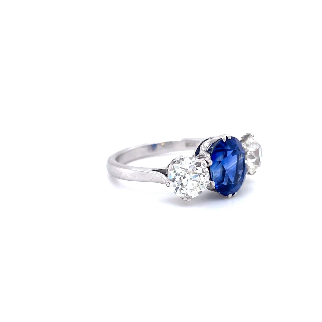 3.65ct Oval Sapphire and Round Diamond Three Stone Ring
