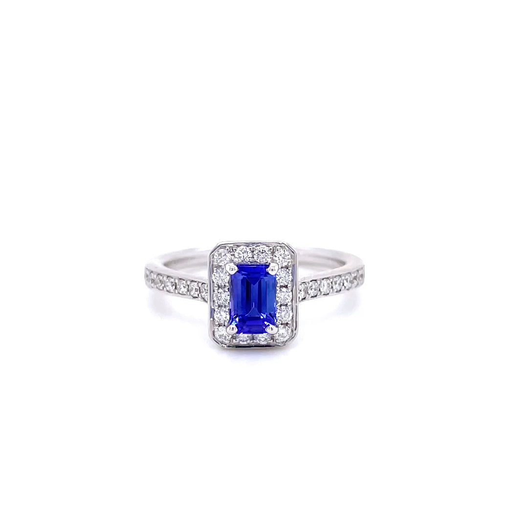 0.69ct Emerald Cut Tanzanite and Diamond Cluster Ring