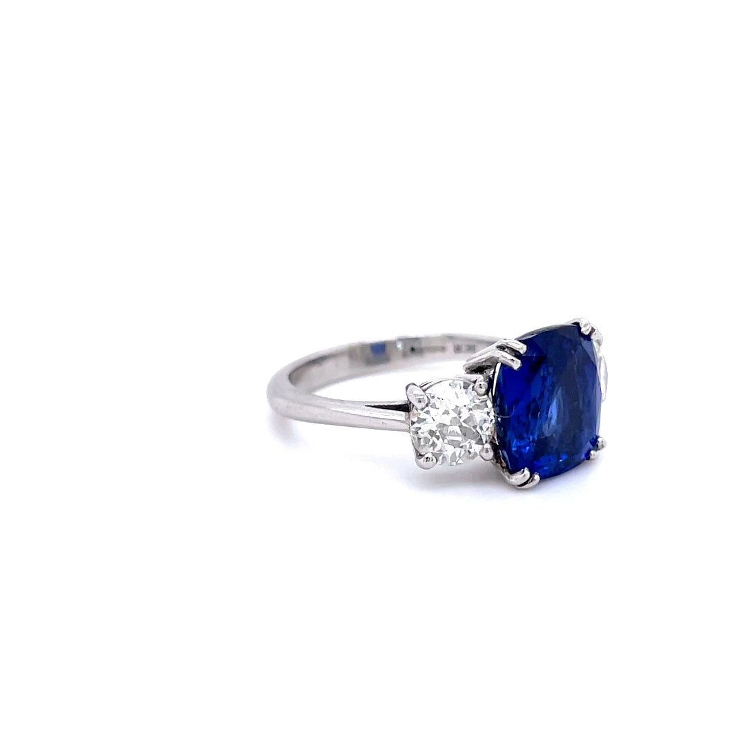 4.12ct Cushion Cut Sapphire and Round Diamond Three Stone Ring
