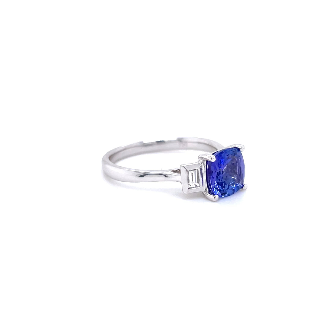 1.57ct Cushion Tanzanite and Diamond Three Stone Ring