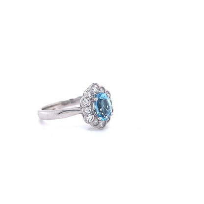 0.73ct Oval Aquamarine And Diamond Cluster Ring