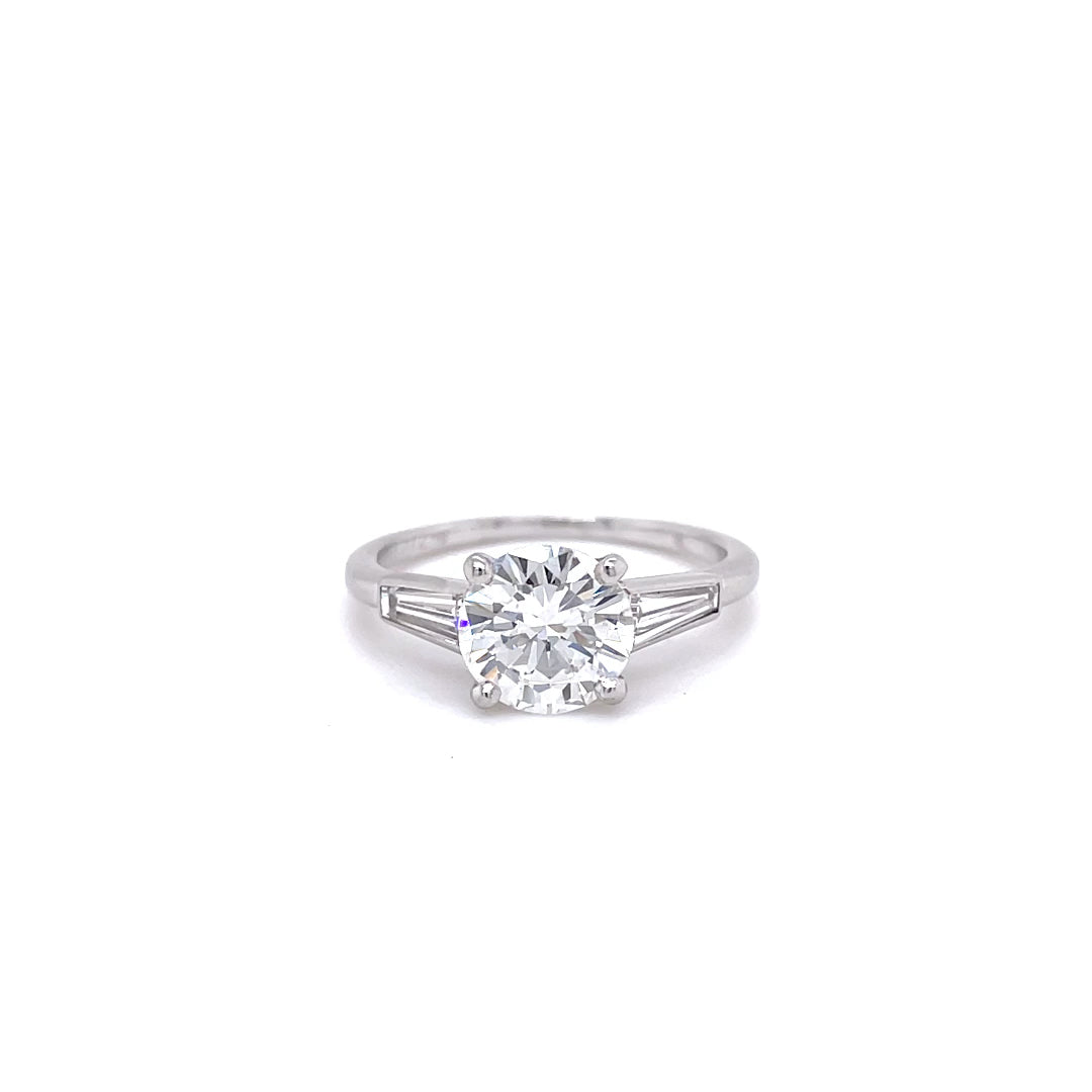 Cartier 1.37ct Round Diamond And Tapered Baguette Solitaire Ring