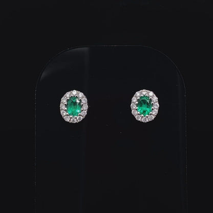 18ct White Gold 0.64ct Oval Cut Emerald And Diamond Cluster Earrings
