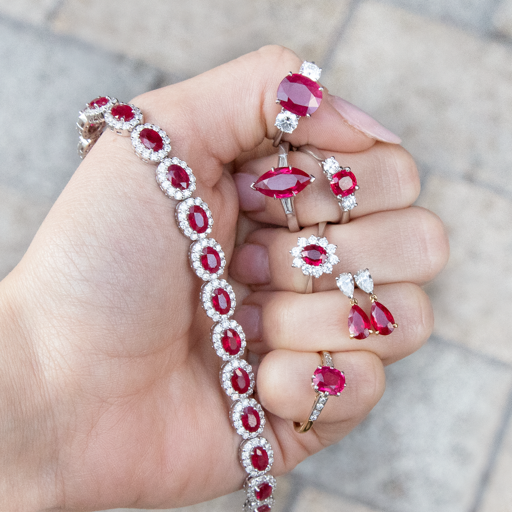 0.73ct Oval Ruby And Diamond Cluster Ring