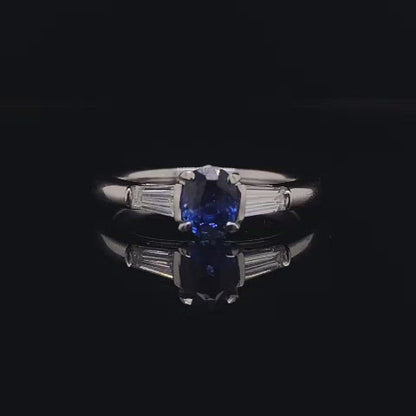 Oval Cut Sapphire and Tapered Baguette Cut Diamond Three Stone Ring