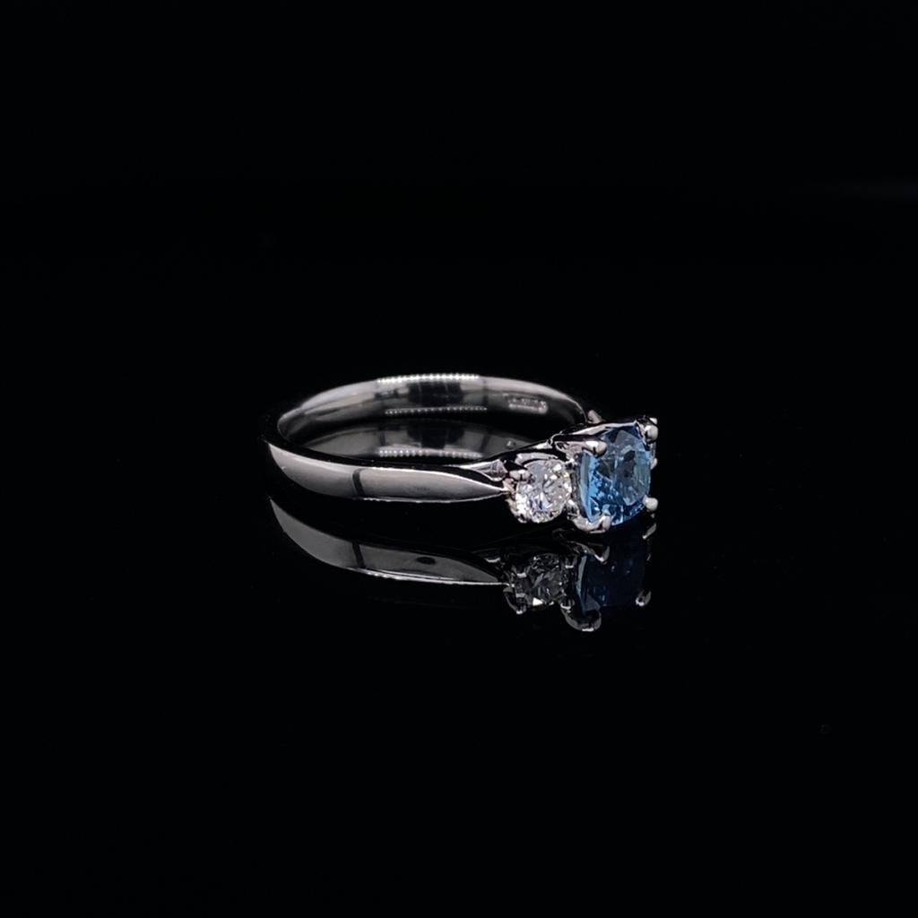 0.51ct Cushion Aquamarine And Round Diamond Three Stone Ring