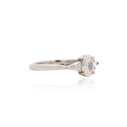 Certified 0.71ct Oval And Pear Cut Diamond Three Stone Ring