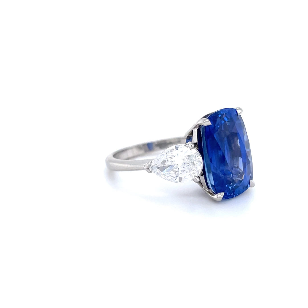 8.56ct Cushion Sapphire And Pear Cut Diamond Three Stone Ring