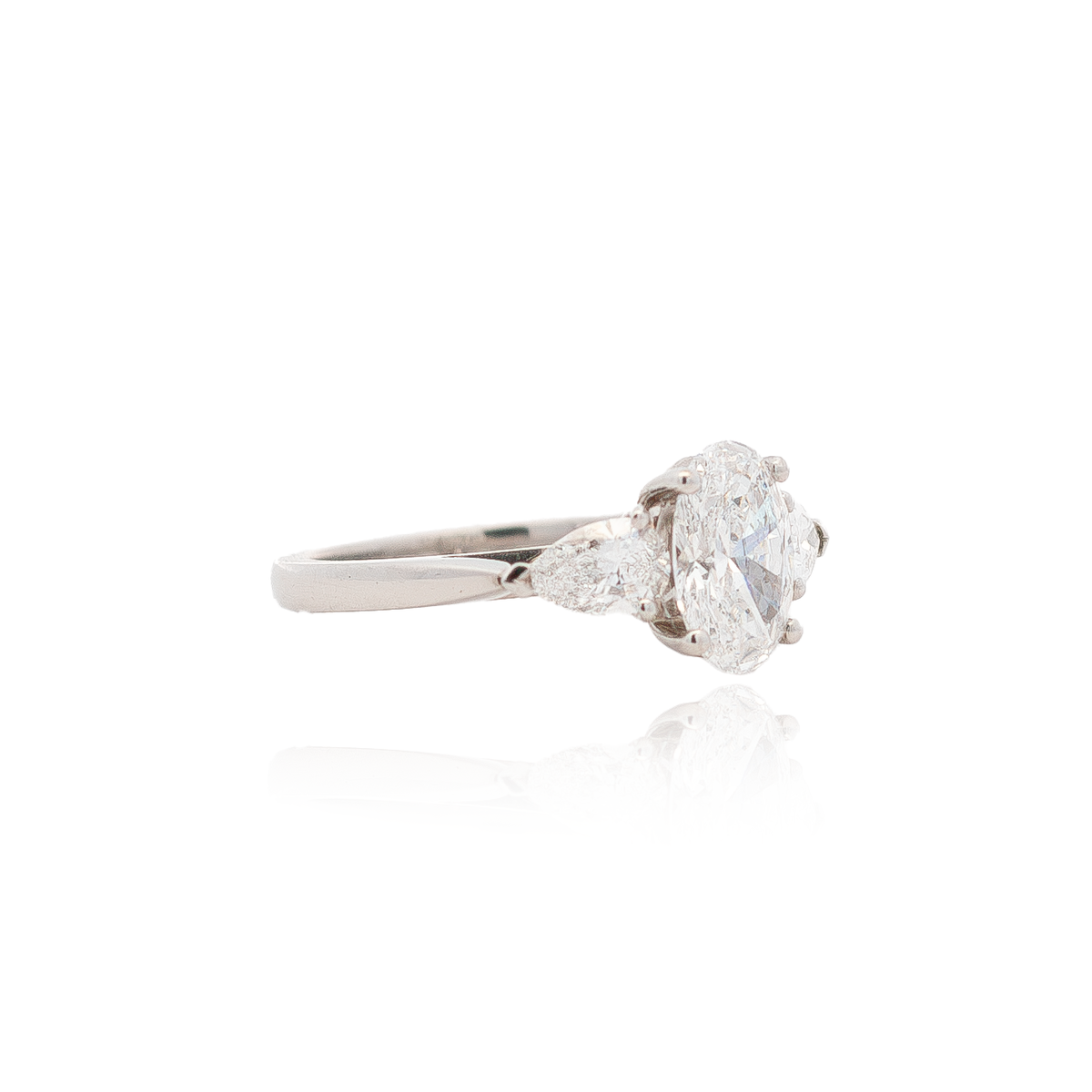 1.55ct Certified Oval Diamond And Pear Cut Diamond Three Stone Ring