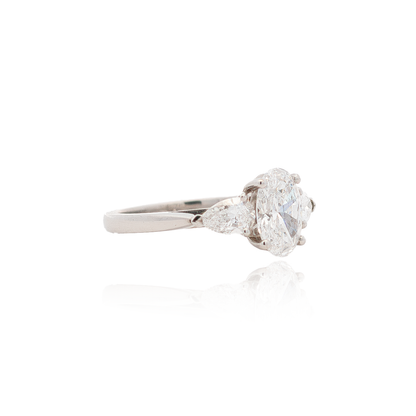 1.55ct Certified Oval Diamond And Pear Cut Diamond Three Stone Ring
