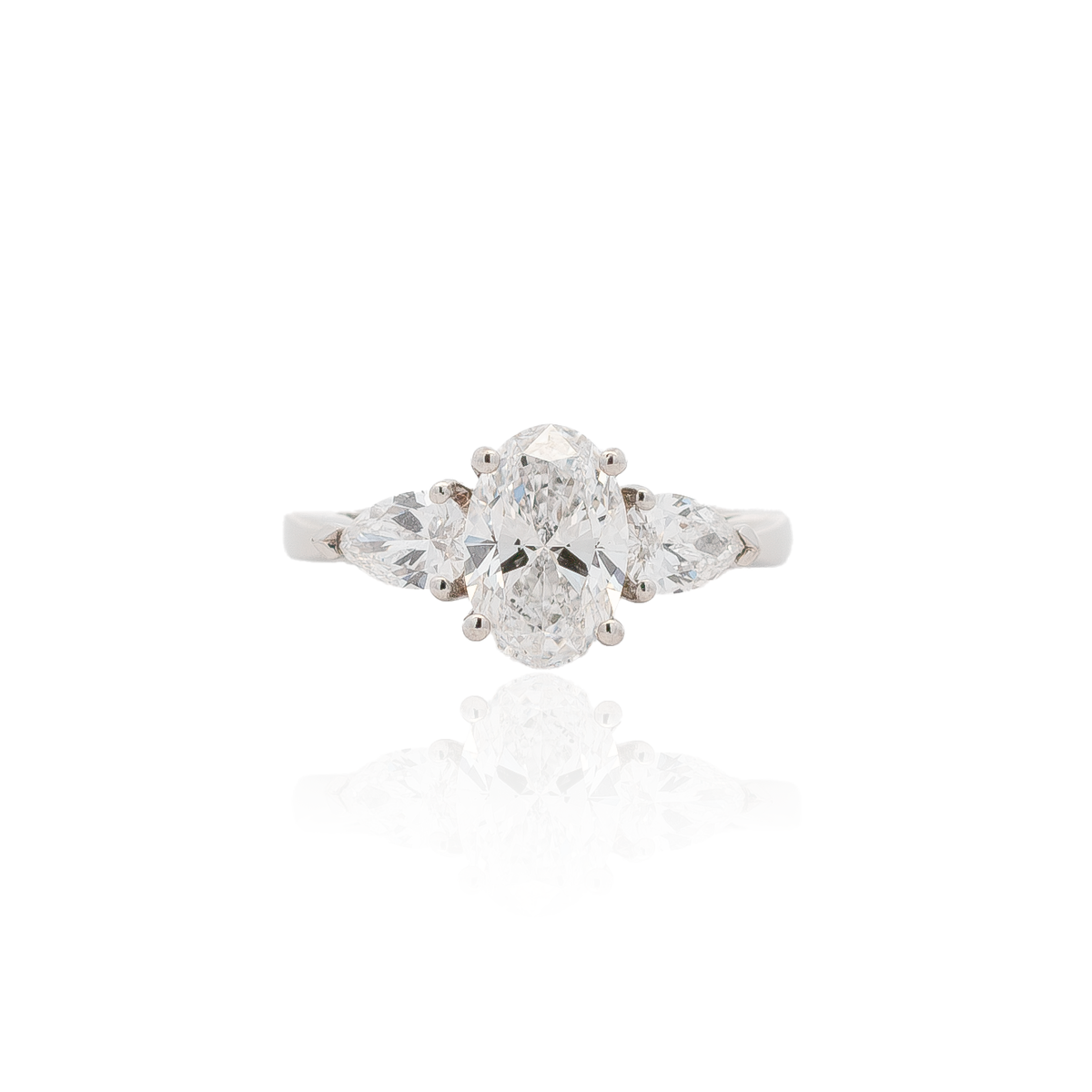 1.55ct Certified Oval Diamond And Pear Cut Diamond Three Stone Ring