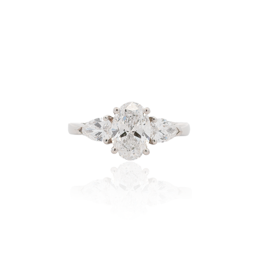 1.55ct Certified Oval Diamond And Pear Cut Diamond Three Stone Ring
