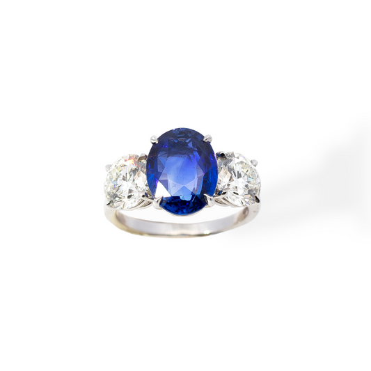 4.82ct Burmese Unheated Oval Sapphire And Round Diamond Three Stone Ring
