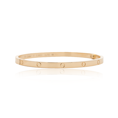 Cartier LOVE bangle small | Size 17, yellow gold