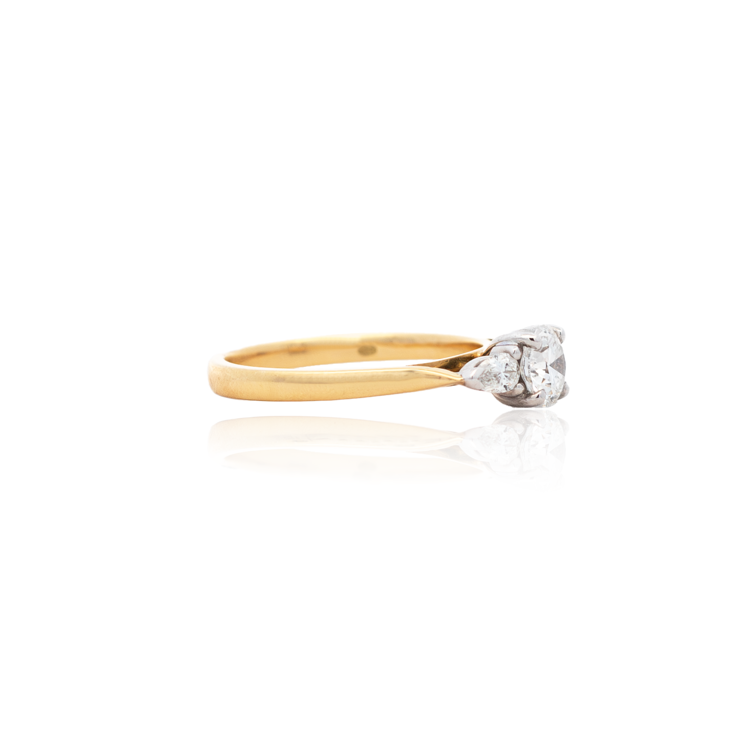 0.60ct Round Diamond And Pear Cut Diamond Three Stone Ring