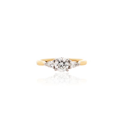 0.60ct Round Diamond And Pear Cut Diamond Three Stone Ring