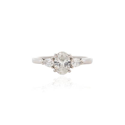 Certified 0.71ct Oval And Pear Cut Diamond Three Stone Ring