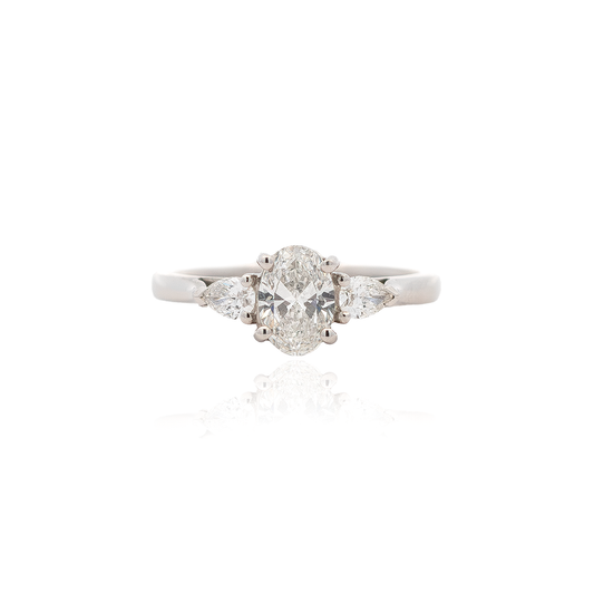 Certified 0.71ct Oval And Pear Cut Diamond Three Stone Ring