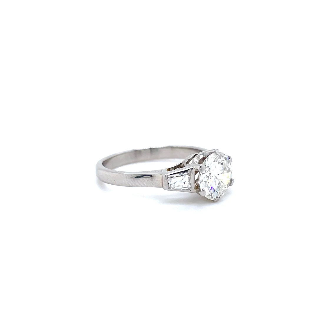 1.29ct Round Diamond And Tapered Baguette Three Stone Ring