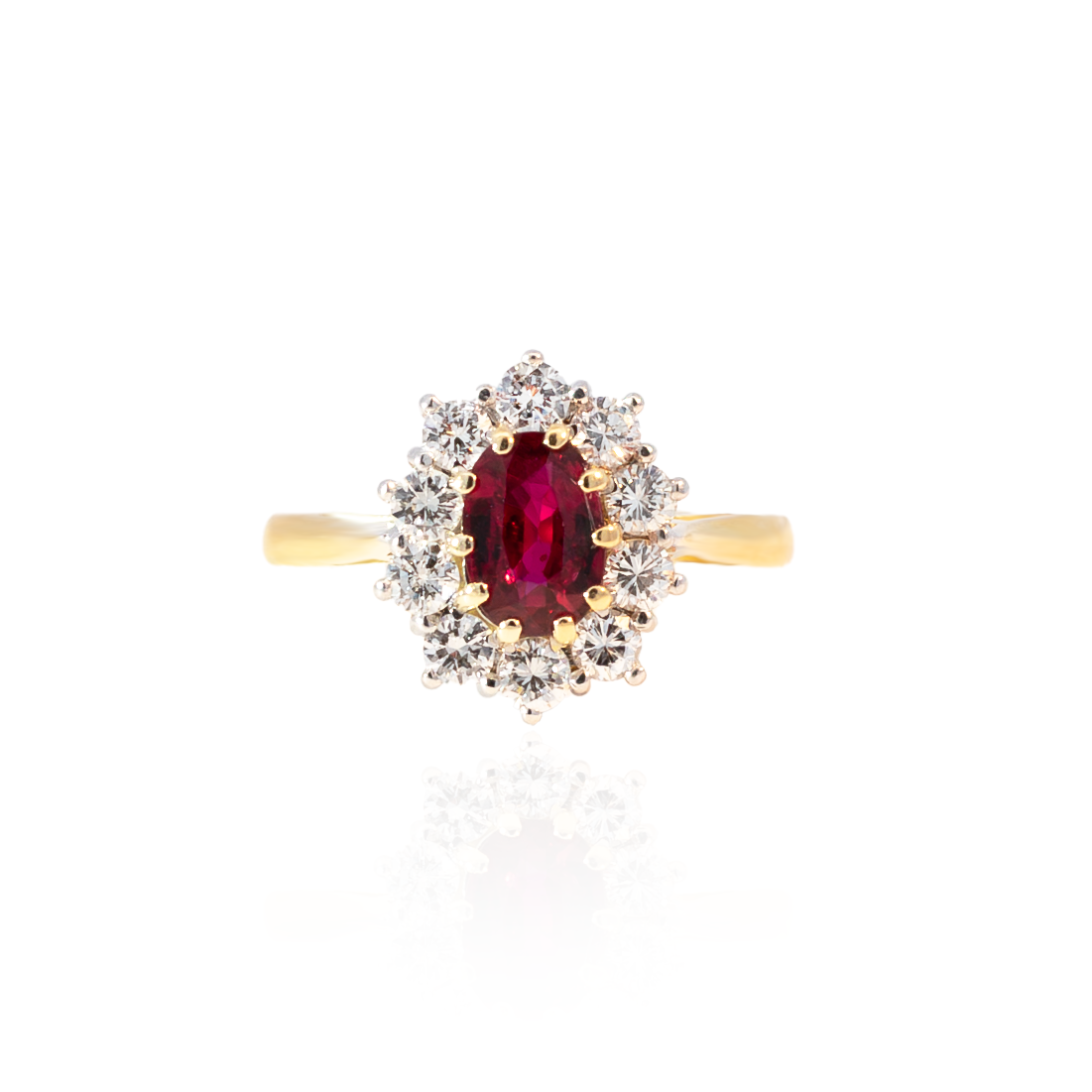 Oval Ruby And Round Diamond Cluster Ring