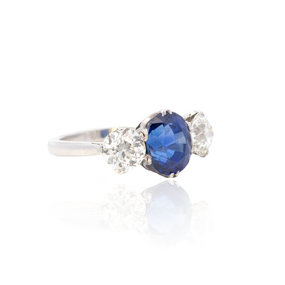 3.65ct Oval Sapphire and Round Diamond Three Stone Ring
