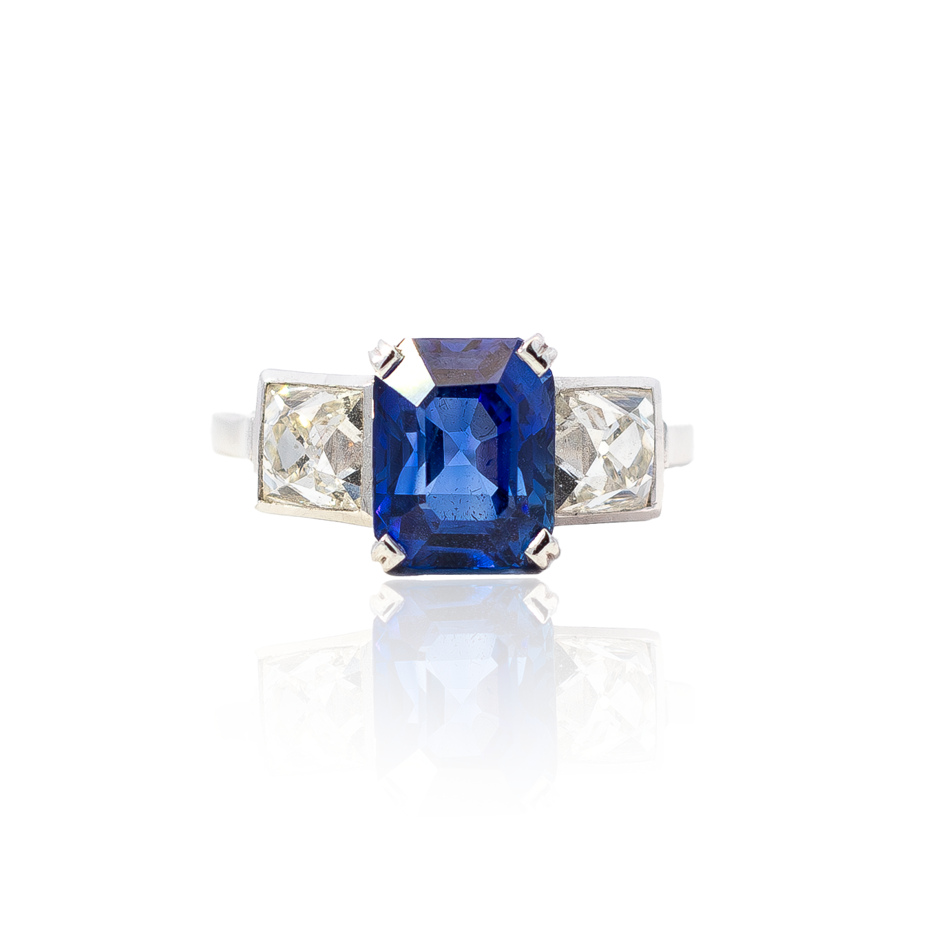 4.12ct Emerald Cut Sapphire And French Cut Diamond Three Stone Ring