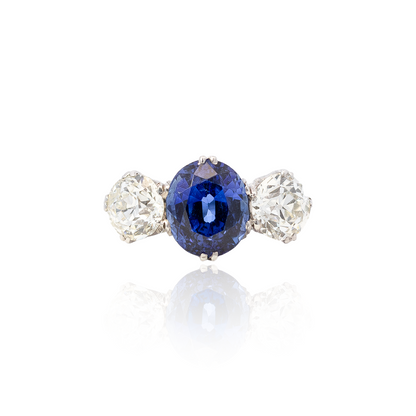 3.65ct Oval Sapphire and Round Diamond Three Stone Ring