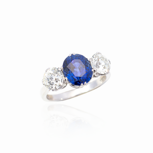 3.65ct Oval Sapphire and Round Diamond Three Stone Ring