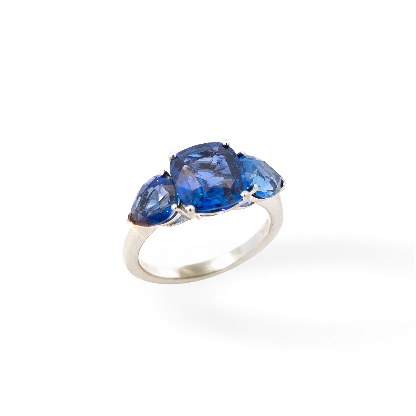 5.87ct Cushion And Pear Cut Sapphire Three Stone Ring