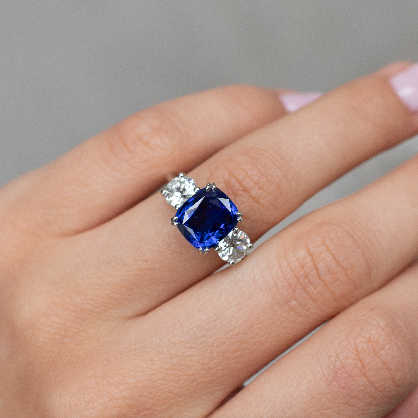 4.12ct Cushion Cut Sapphire and Round Diamond Three Stone Ring