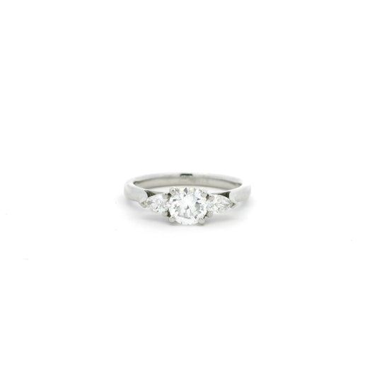 0.60ct Round Diamond And Pear Cut Diamond Three Stone Ring
