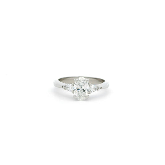 Certified 0.71ct Oval And Pear Cut Diamond Three Stone Ring