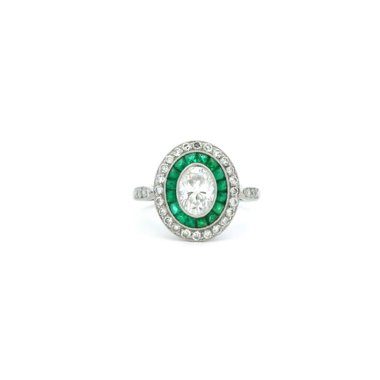 1.04ct Oval Diamond And Calibre Emerald Target Ring