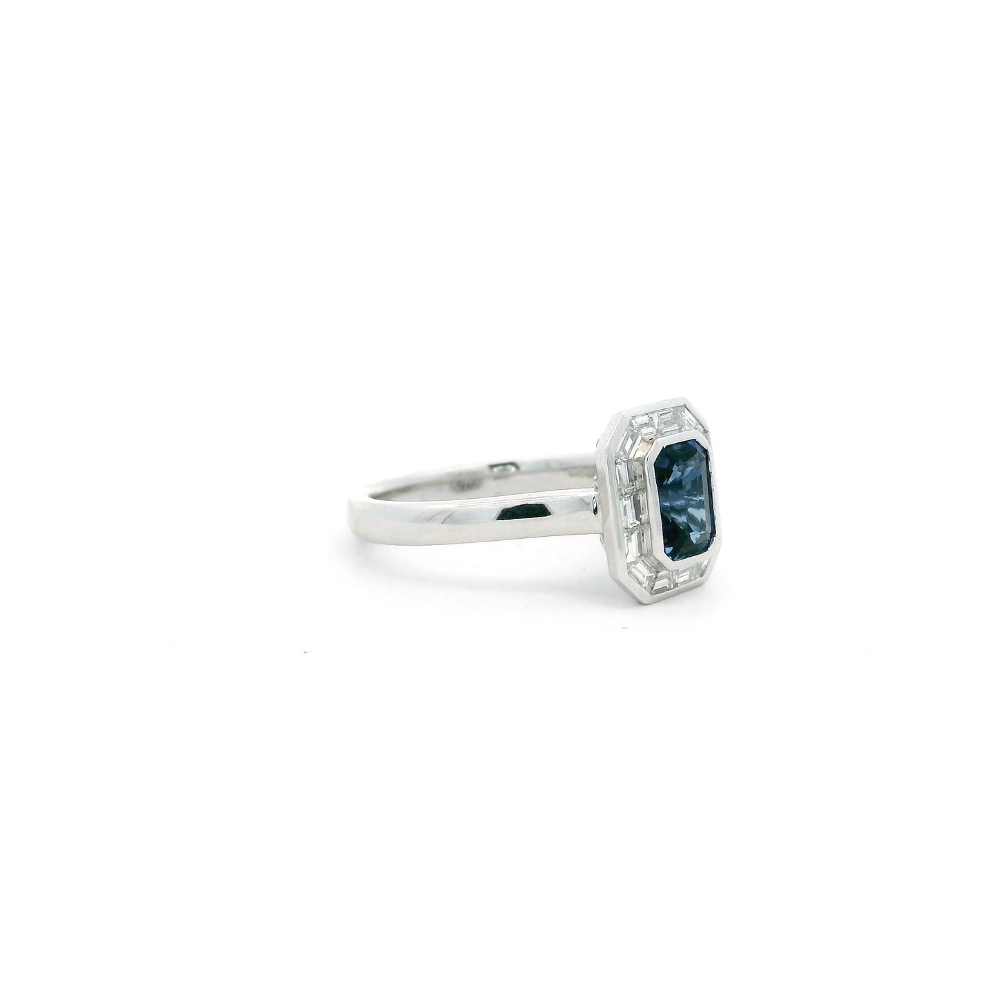 1.13ct Emerald Cut Sapphire And Baguette Cut Diamond Cluster Ring