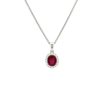 0.64ct Oval Ruby And Round Diamond Cluster Pendant