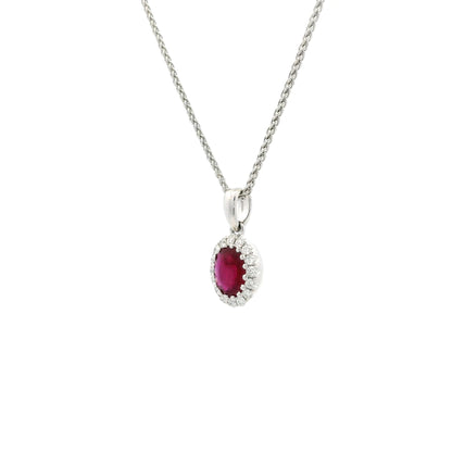 0.64ct Oval Ruby And Round Diamond Cluster Pendant