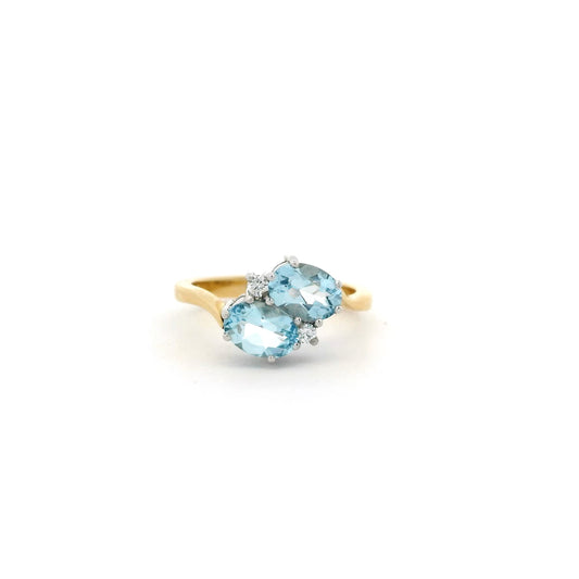 1.30ct Oval Aquamarine And Diamond Two Stone Cross Over Ring