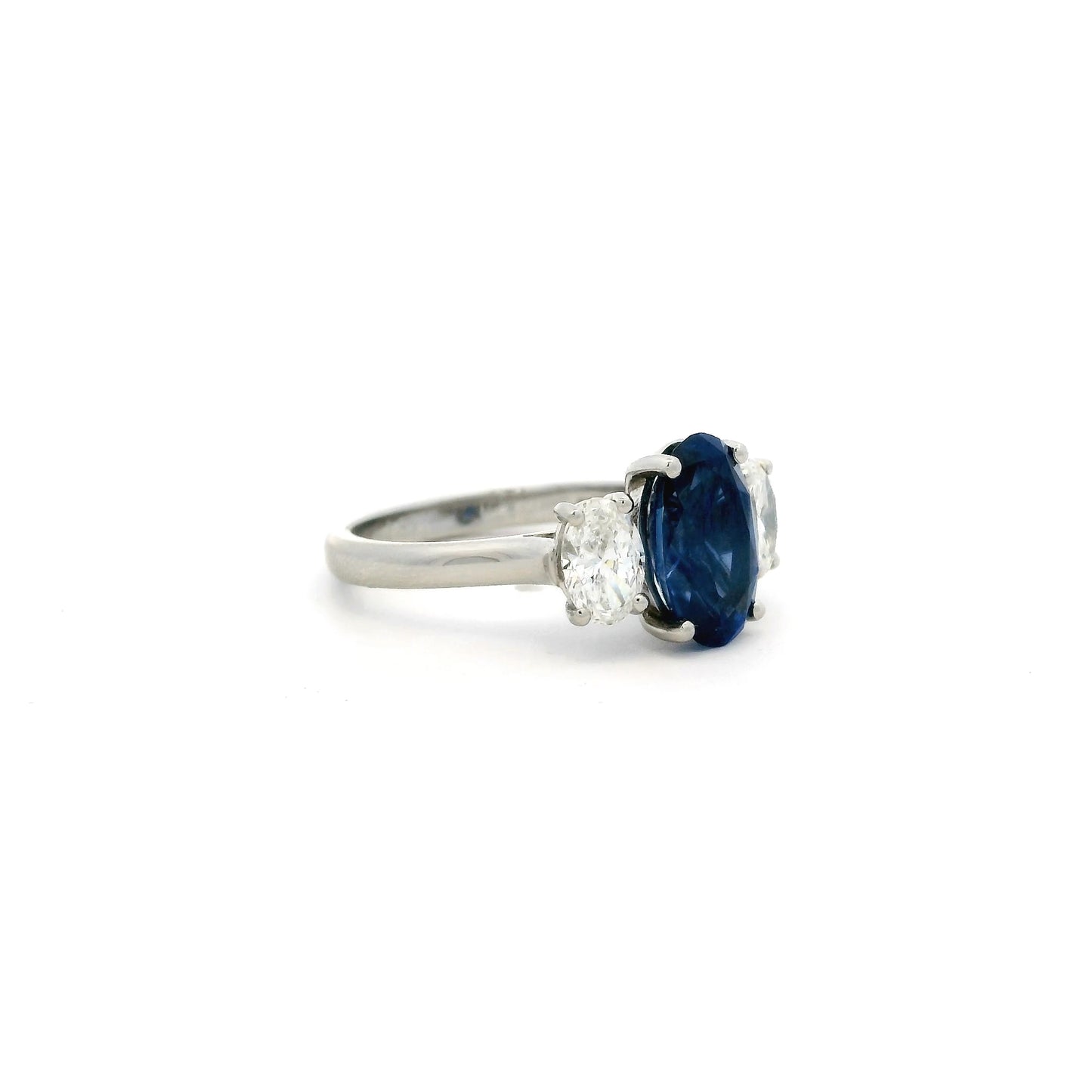 2.95ct Oval Sapphire And Diamond Three Stone Ring