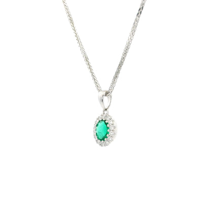 0.28ct Oval Emerald And Diamond Cluster Pendant